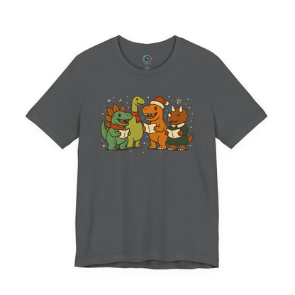 Dinosaur Carolers T-Shirt – Cute Dino Christmas Singing Tee on dark asphalt background featuring dino carolers with snowflakes
