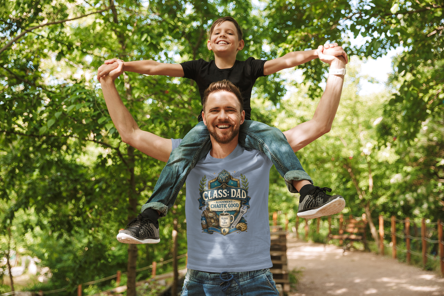 Man carrying a child on his shoulders with a forest background wearing a Chaotic Good Dad T-Shirt – RPG Gamer Dad Graphic Tee in steel blue