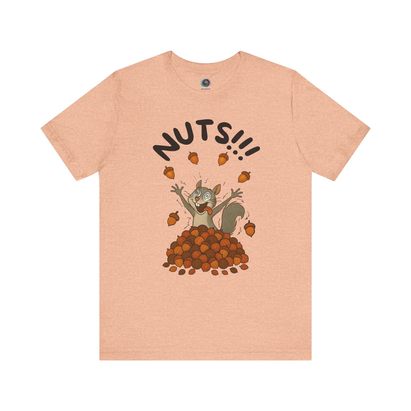 Crazy Squirrel Shirt – Funny Squirrel Nuts T-Shirt for Quirky Style laid flat in heather peach with fun squirrel character and scattered nuts