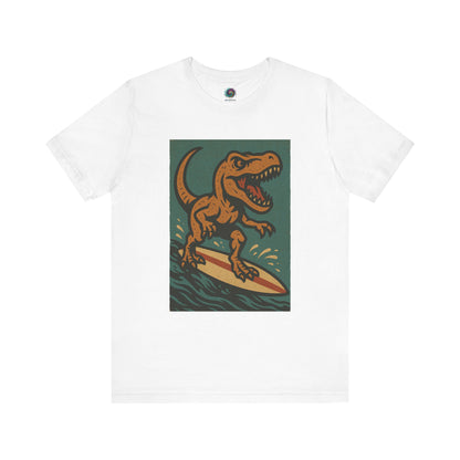 Surfing T-Rex T-Shirt – Funny Dinosaur Surfing Graphic Tee for Summer Vibes in white, highlighting a dinosaur surfing graphic perfect for summer vacations. a clean and bold surfing dinosaur design perfect for beach trips and casual surf wear.