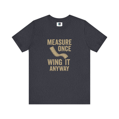 Measure Once Wing It Anyway T-Shirt in heather navy, blending witty construction humor with casual everyday style.