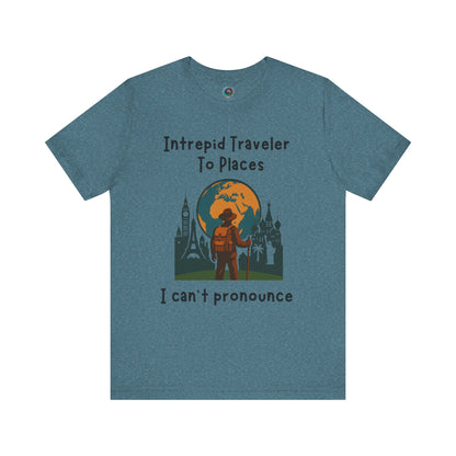 Dark teal t-shirt with a graphic design  with landmarks and the world and text on a white background for global travelers