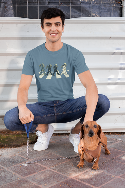 Abbey Road Shirt – Lifestyle
Cthulhu Crossing T-Shirt – Beatles Abbey Road Parody Tee in teal, modeled outdoors with dog, fun Cthulhu rocker parody shirt.