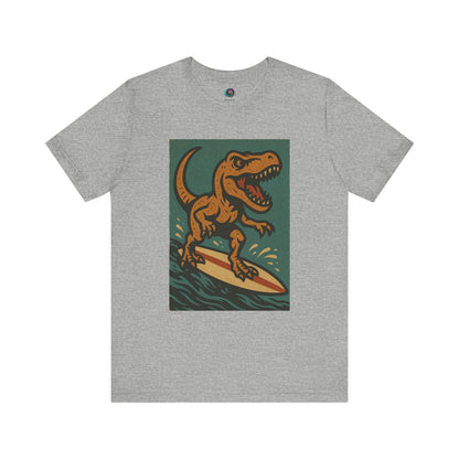 Surfing T-Rex T-Shirt – Funny Dinosaur Graphic Tee  in grey, featuring a surfing dinosaur riding a wave — the perfect dinosaur surfing shirt for beach days.