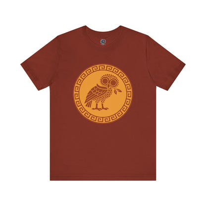 Athena’s Owl T-Shirt in rich rust, celebrating the grounded wisdom of Athena’s owl with a warm palette and classical design.