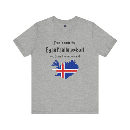 Eyjafjallajökull T-Shirt – Funny Iceland Volcano Travel Merch in athletic heather grey with humorous tourist design highlighting the Eyjafjallajökull volcano and Iceland flag.