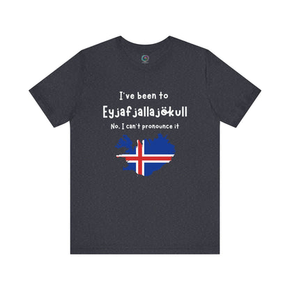 Eyjafjallajökull T-Shirt – Funny Iceland Volcano Travel Merch in heather navy, featuring stylized Eyjafjallajökull volcano design and Iceland flag graphic.