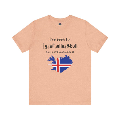 Eyjafjallajökull T-Shirt – Funny Iceland Volcano Travel Merch in warm heather peach color, perfect for Iceland travel lovers who appreciate humorous designs.