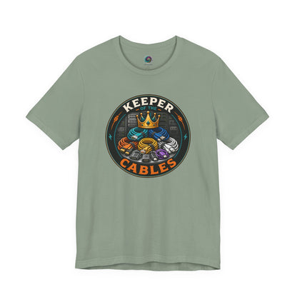 Keeper of the Cables T-Shirt – Funny Tech Dad Cable Tee on sage for the dad who can somehow find the right charger eventually.
