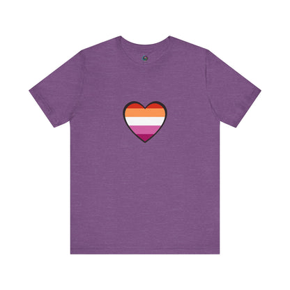 Lesbian Pride Flag Heart T-Shirt – Bold LGBTQ+ Graphic Tee in heather team purple, combining softness and strength with a central lesbian flag heart.