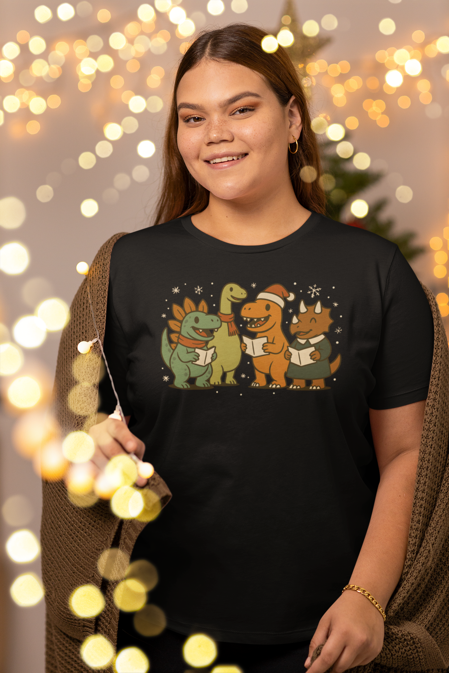 Dinosaur Carolers T-Shirt – Cute Dino Christmas Singing Tee in black with holiday bokeh and dinosaurs singing carols