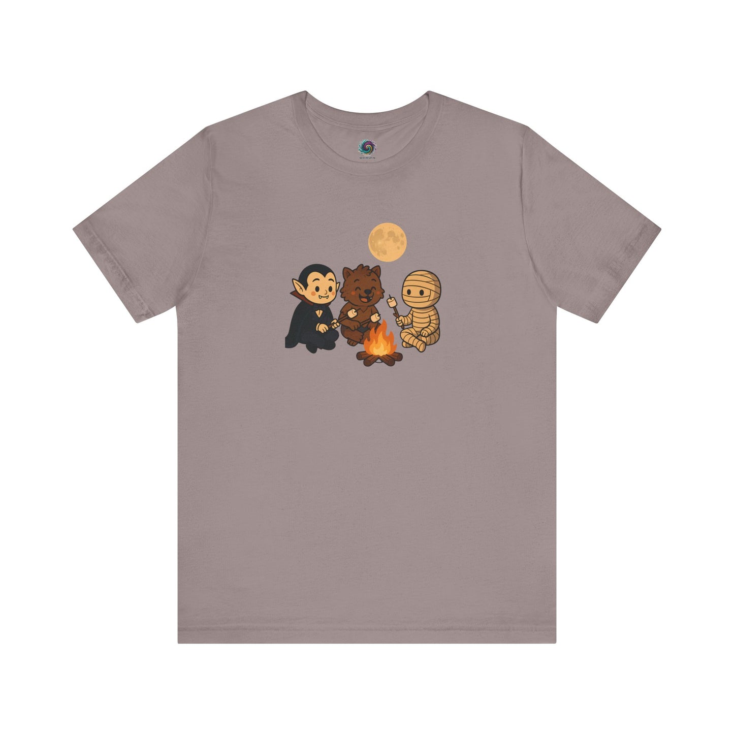 Halloween Monsters Campfire T-Shirt in Pebble Brown from WhimSpin showing a trio of adorable monsters—vampire, werewolf, and mummy—roasting marshmallows under a full moon.