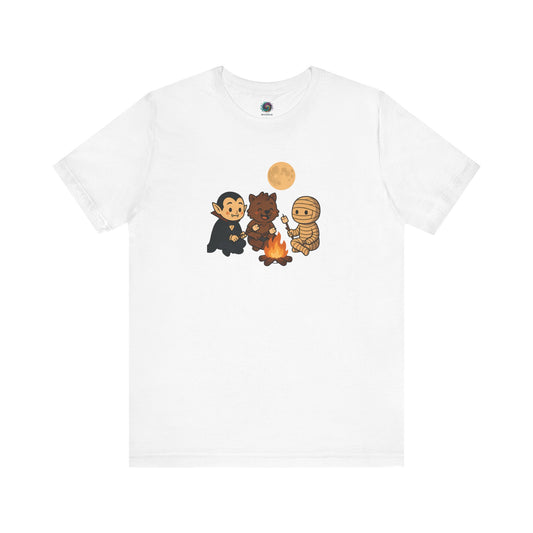 Halloween Monsters Campfire T-Shirt in white showing a humorous and cute monster campfire scene, ideal for spooky season.