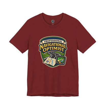 Cardinal Professional Navigation Optimist Tee featuring playful travel humor and “Professional Navigational Optimist” slogan