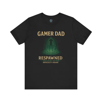 Gamer Dad Respawned T-Shirt – Funny New Dad Shirt for Gamers in classic black with glowing green silhouette design.