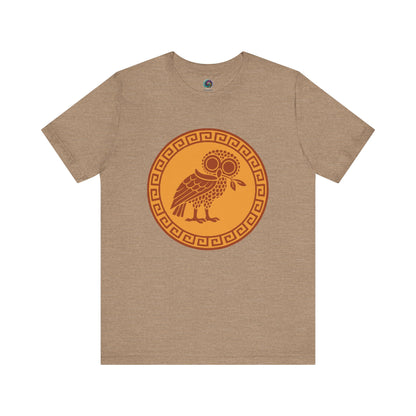 Athena’s Owl T-Shirt in heather tan, showing the wise owl of Athena against soft neutral tones, ideal for lovers of Athena’s owl and classical mythology.