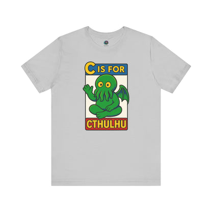 C is for Cthulhu T-Shirt – Lovecraftian Funny Cartoon Tee in grey, flat lay design showing playful cartoon Cthulhu artwork.