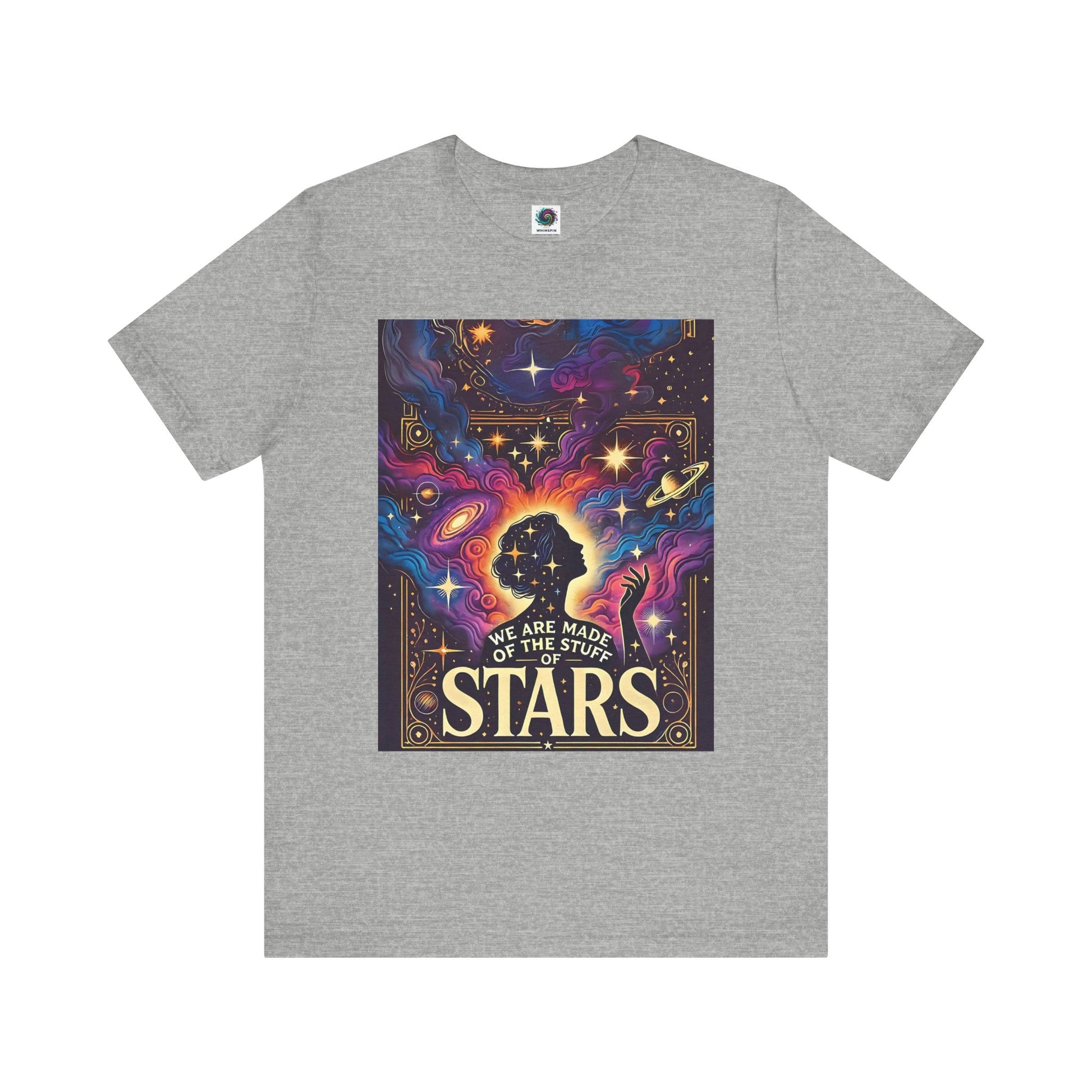 Grey flat-lay of cosmic clothing with colorful star-filled design and silhouette of a woman in space