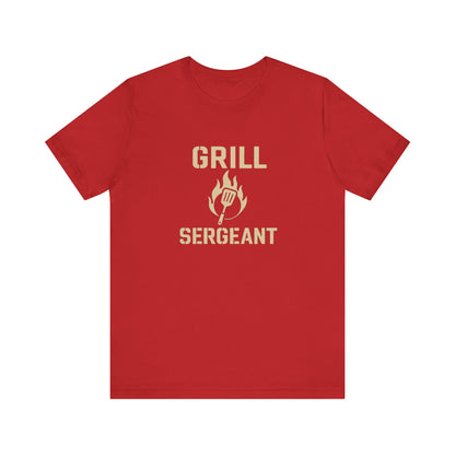Grill Sergeant Shirt – Funny BBQ T-Shirt for Grill Lovers - Red flat lay Grill Sergeant shirt with playful BBQ theme for Father’s Day or cookout lovers.