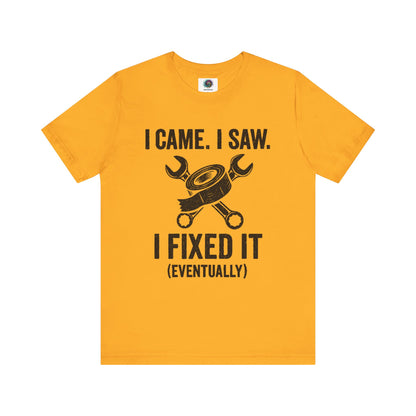 Funny Fix-It T-Shirt – "I Came, I Saw, I Fixed It... Eventually" DIY Repair Humor Tee in gold yellow, lighthearted tee for DIYers.
