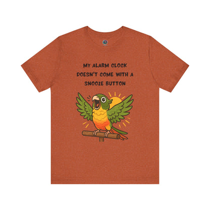Parrot Alarm Clock T-Shirt – Funny Parrot Wake-Up Call Tee in Heather Autumn, showing the animated parrot illustration, bright accent lines, and playful early-morning wake-up message across the front.