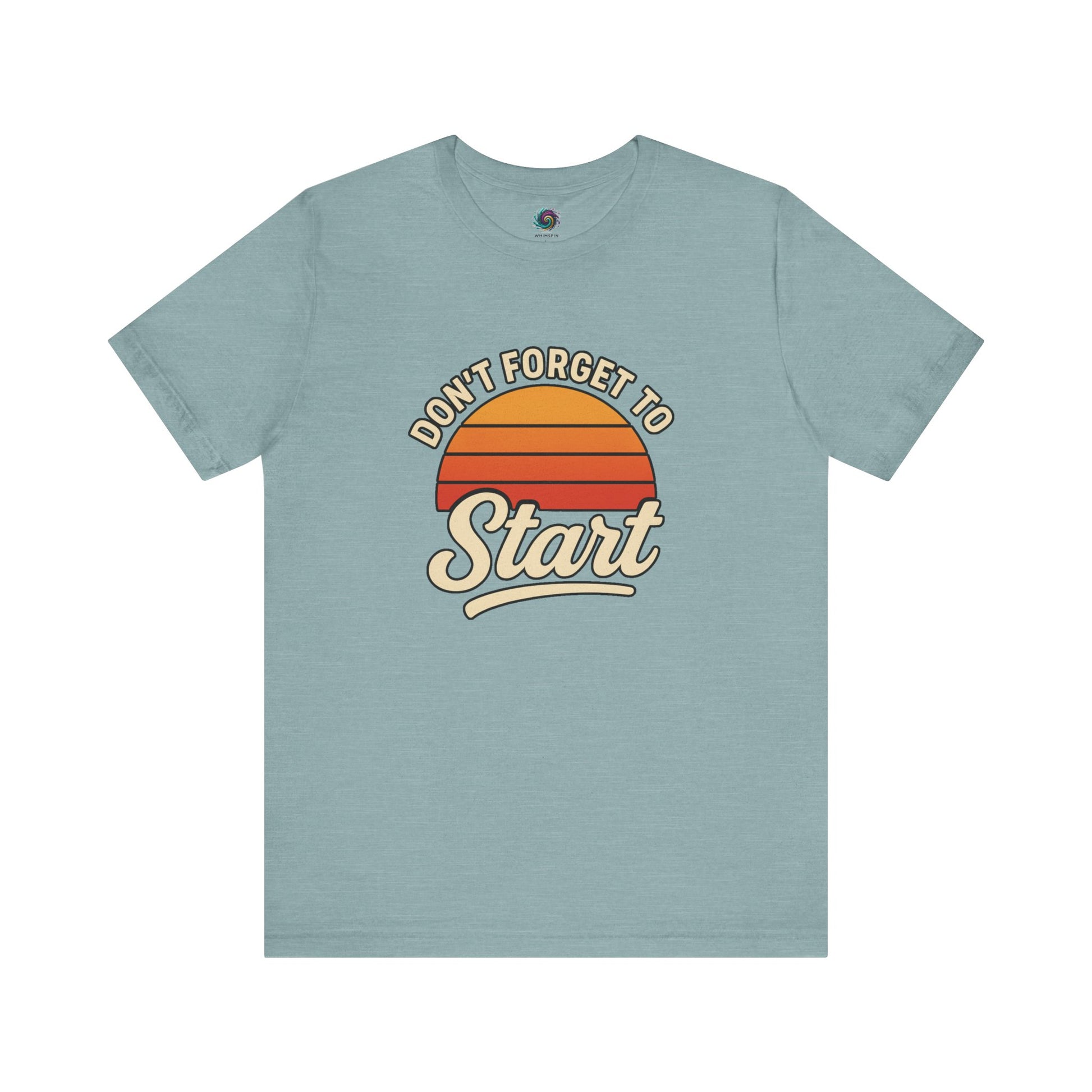 Don’t Forget to Start T-Shirt – Motivational Graphic Tee for Dreamers in Heather Blue laid flat with stylized retro sunburst artwork