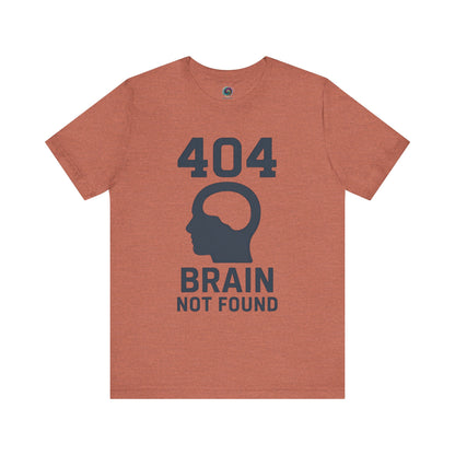 Heather Clay "404 Brain Not Found T-Shirt" from WhimSpin. The tshirt graphic is a profile image of a human head with an empty hole where the brain should be and the text "404 Brain Not Found."