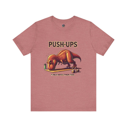 T-Rex Push-Up T-Shirt – Funny Dinosaur Workout Graphic Tee in heather mauve, ideal for those who love funny t rex workout humor.