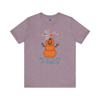 Pumpkin Snowman T-Shirt – It’s Never Too Early for Christmas in heather purple, funny Halloween snowman shirt with festive pumpkin design.