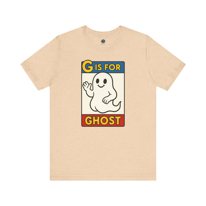 G is for Ghost T-Shirt – Funny Monster Alphabet Halloween Tee in heather sand dune, ghost alphabet shirt with whimsical ghost design.
