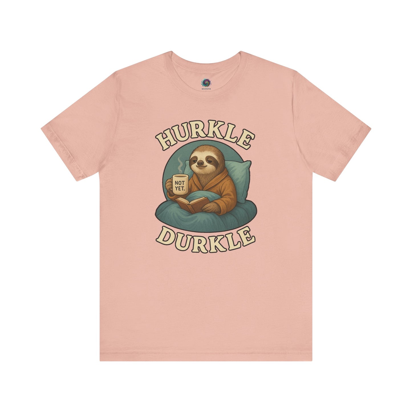 Hurkle Durkle Sloth T-Shirt – Cozy Sloth Shirt for Lazy Days laid flat in soft Peach color, emphasizing cozy design and relaxed tone