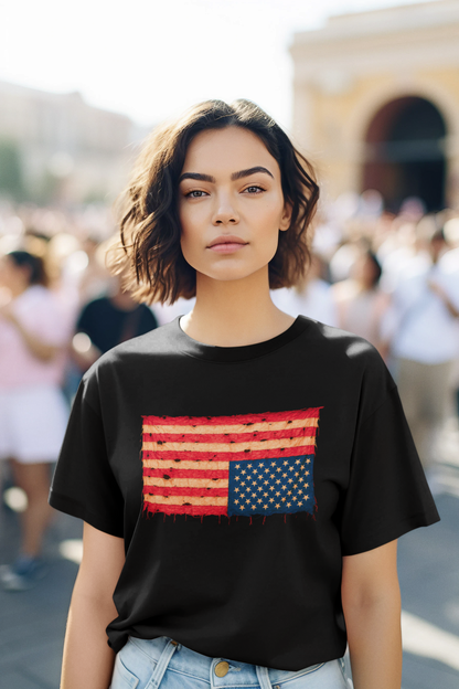 Inverted Flag Distressed T-Shirt – Nation in Distress Graphic Tee shown on a woman wearing the black version in a busy outdoor environment.