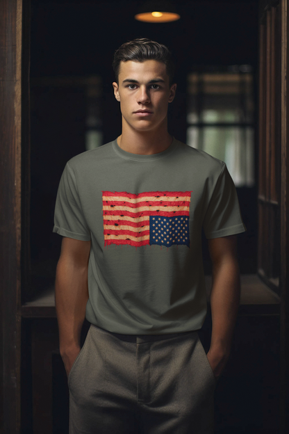 Inverted Flag Distressed T-Shirt – Nation in Distress Graphic Tee shown on a man wearing heather military green indoors with dramatic low lighting.