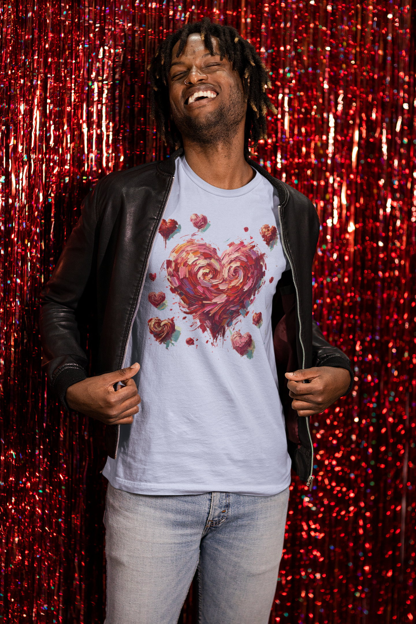 Man smiling in front of red tinsel background wears Light Blue Impressionistic Heart T-Shirt – Artistic Valentine's Day Tee