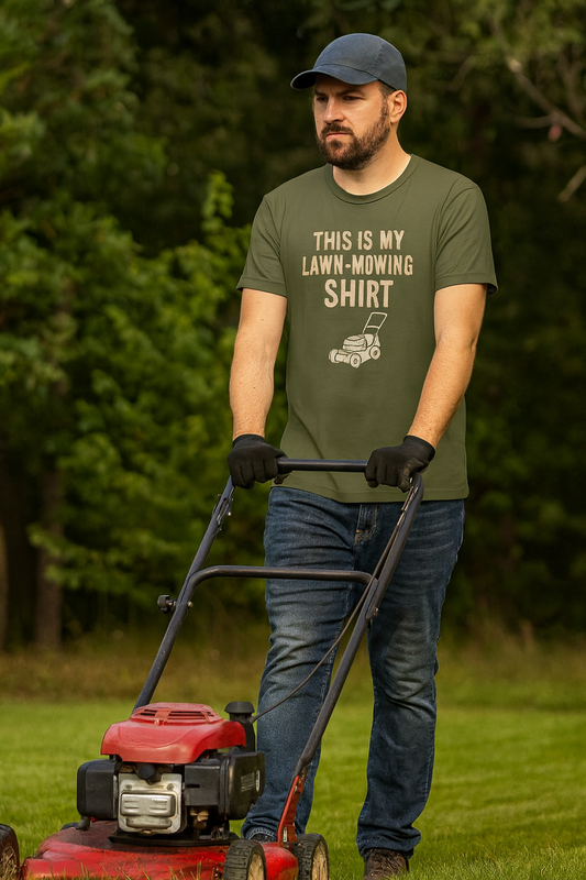 Funny Lawn Mowing Shirt – Summer Yard Work T-Shirt with Mower Graphic in military green, worn by man pushing red lawn mower outdoors.
