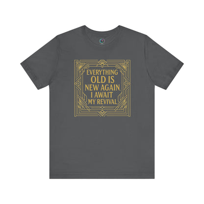 Everything Old Is New Again – I Await My Revival shirt in asphalt gray with ornate gold Art Deco border and vintage-inspired lettering.