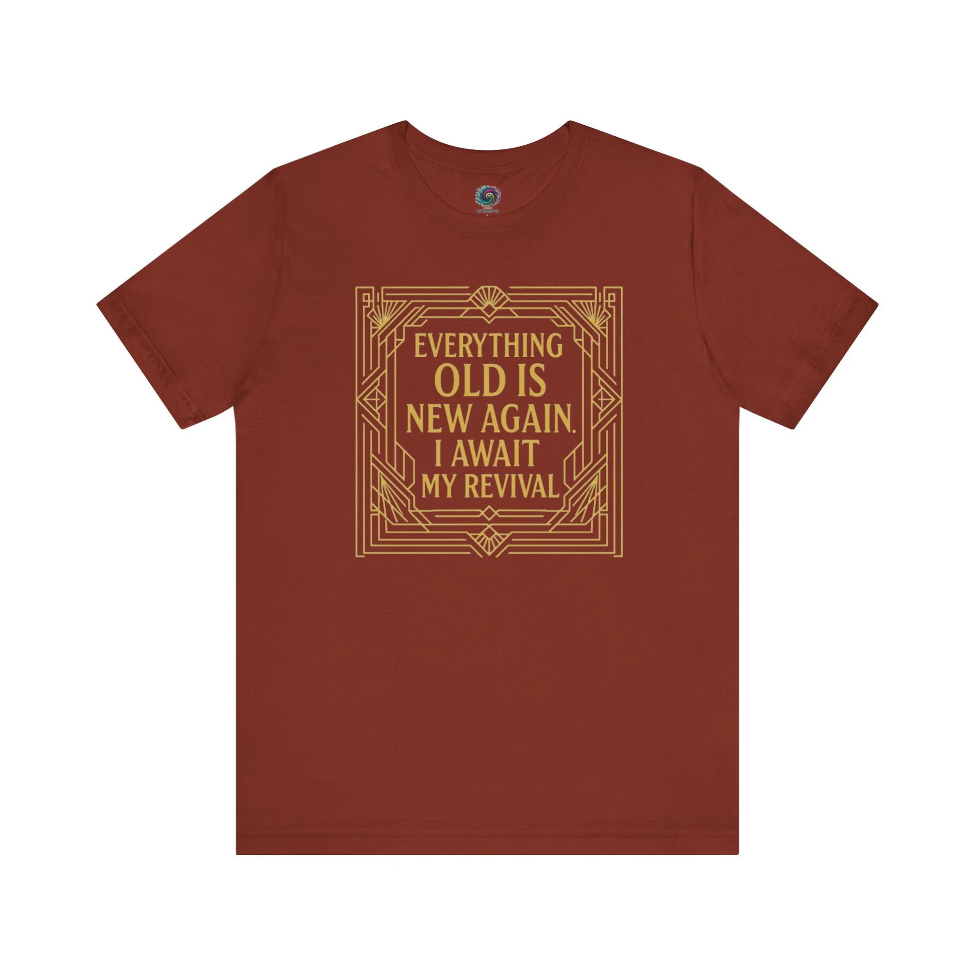 Rust-colored tee with gold Art Nouveau frame and witty phrase about revival and aging—Everything Old Is New Again.