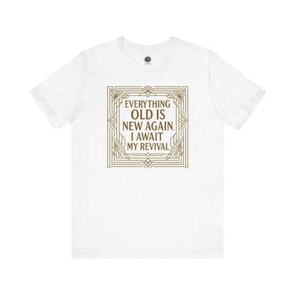 White t-shirt with bold gold decorative border reading Everything Old Is New Again – I Await My Revival, combining vintage charm and self-love.