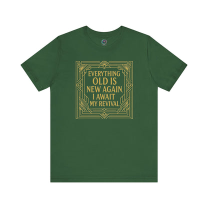 Evergreen shirt with gold Art Nouveau detailing around the humorous aging phrase Everything Old Is New Again – I Await My Revival.