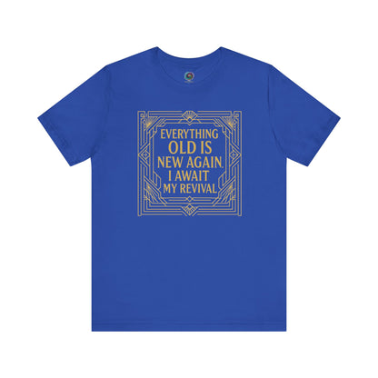 Royal blue shirt featuring ornate Art Nouveau design and humorous quote about self-reinvention and aging.