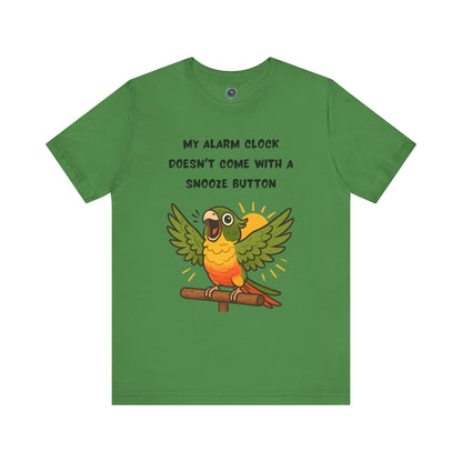 Parrot Alarm Clock T-Shirt – Funny Parrot Wake-Up Call Tee in Leaf green, showcasing the open-winged parrot character, radiating line details, and cheerful morning alarm phrase.