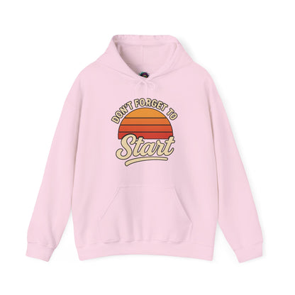Don’t Forget to Start Hoodie – Retro Sunrise Motivational Sweatshirt in Light Pink, softening the retro sunrise graphic with a gentle pastel tone.
