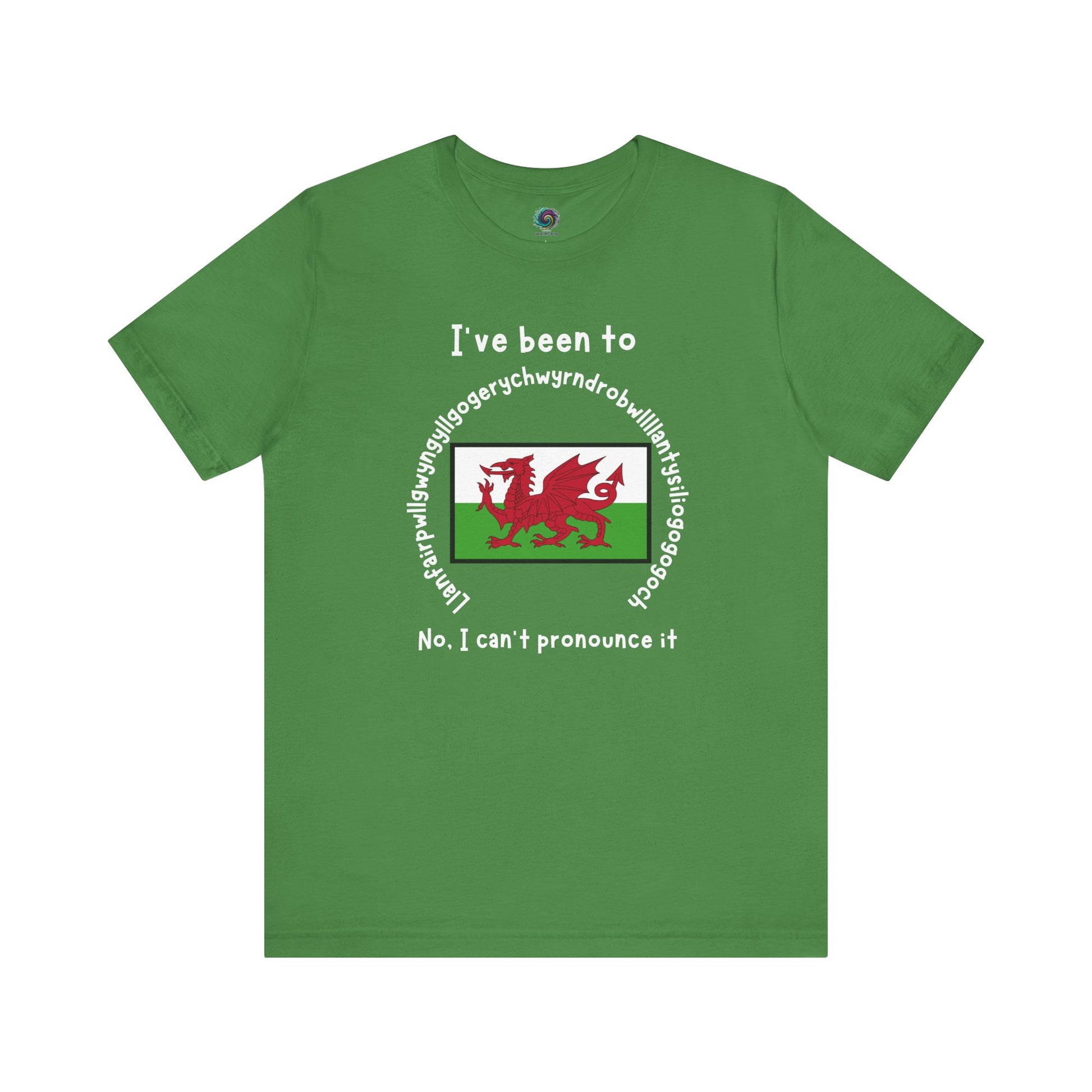 Llanfairpwllgwyngyllgogerychwyrndrobwllllantysiliogogogoch T-Shirt – Funny Wales Travel Merch in leafy green featuring whimsical Welsh text surrounding flag.