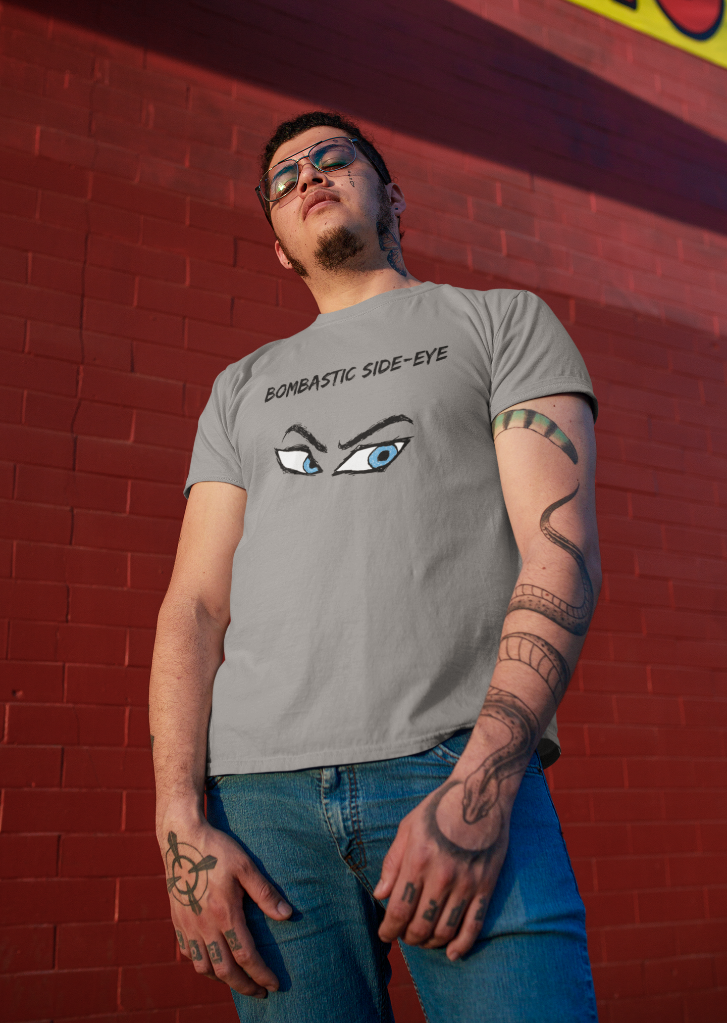 a man wearing the Bombastic Side-Eye T-Shirt – Comic Book Style Meme Graphic Tee in Athletic Heather outdoors, showing the bold side-eye graphic and confident stance.