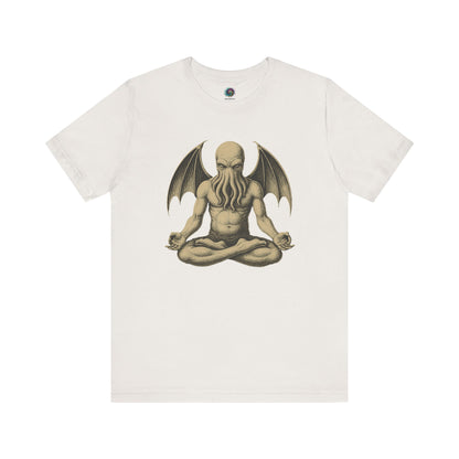 Meditating Cthulhu Shirt – Unisex Mythos Tee for Sci-Fi & Festival Fans in vintage white, for minimalist horror fans who love Cthulhu meditation and peaceful parody.