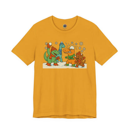 the Dinosaur Snowball Fight T-Shirt – Funny Winter Dino Graphic Tee in Mustard, highlighting the playful dinosaur snowball fight illustration.