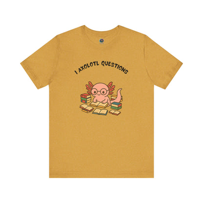 I Axolotl Questions T-Shirt – Funny Curious Axolotl Tee for Book Lovers Heather mustard-colored axolotl shirt with punny quote and pastel book stack illustration