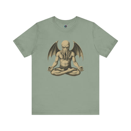 Meditating Cthulhu Shirt – Unisex Mythos Tee for Sci-Fi & Festival Fans in sage green, blending calming earth tones with eerie Cthulhu iconography in a peaceful pose.