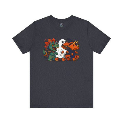 Navy t-shirt with colorful Halloween dinosaur graphic on a white background. he graphic features a stegosaurs dressed as a vampire, a t-rex dressed as a ghost, and a triceratops dressed as a witch