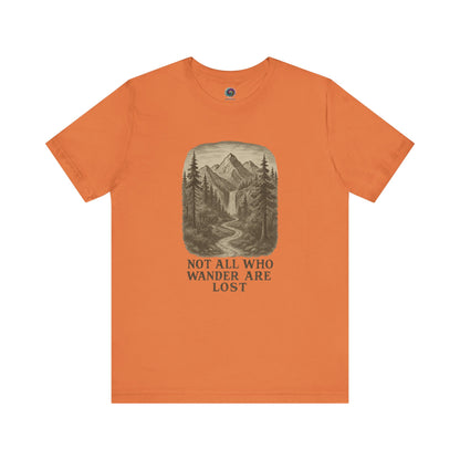 Burnt orange “Not All Who Wander Are Lost T-Shirt – Tolkien Travel Tee for Nature Lovers” featuring mountain trail design with trees and waterfall